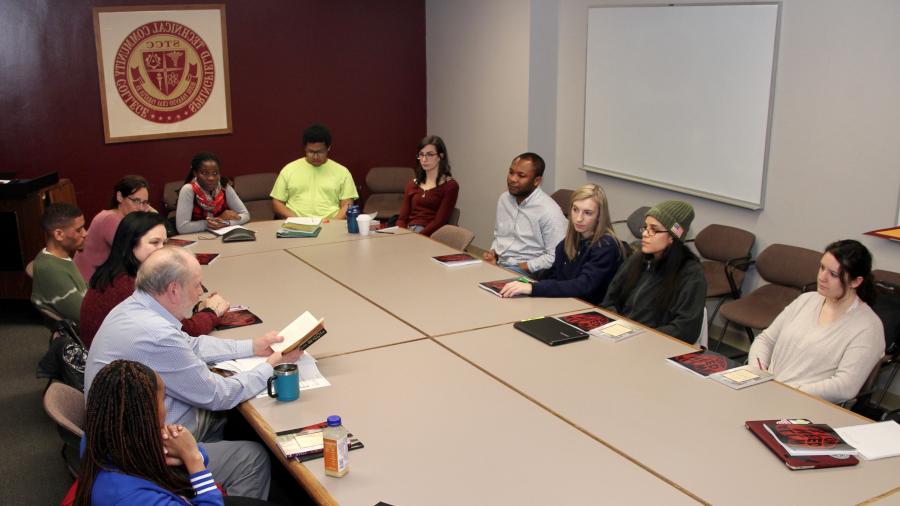 honors program students around meeting table